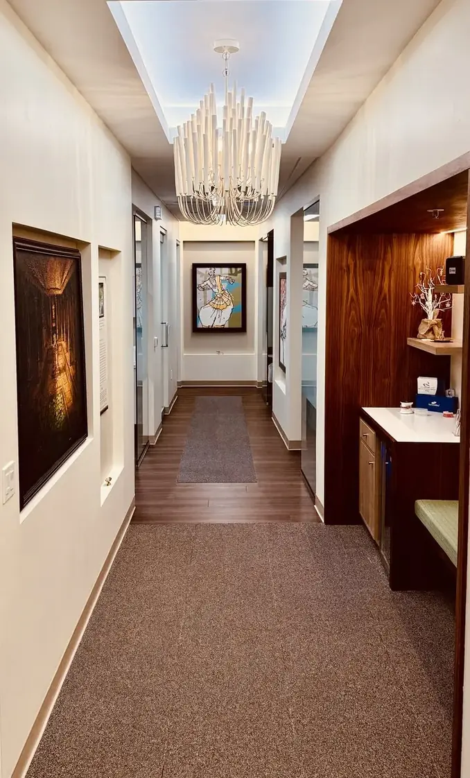 Deccan Dental office hallway with Bharatanatyam dancer artwork, San Mateo